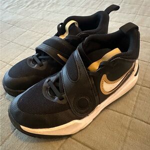 Nike Kids Black and White Sneakers with Gold Accents
